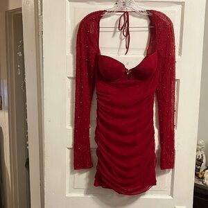 Lady in Red. Fantastic Oh Polly , sz 6 with built in bra , open back , beaded